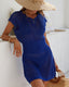 Plus size crochet mesh beach cover-up with buttoned V-neck, short sleeves, and waist-cinching design in lightweight acrylic