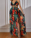 Chiffon maxi beach dress with halter neckline, ditsy floral print, split thigh, and tie-back with chain and ring details