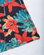 Chiffon maxi beach dress with halter neckline, ditsy floral print, split thigh, and tie-back with chain and ring details