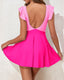 V-neck skirted one-piece swimsuit with ruffle accents, midriff cutout, soft cup bra, and flowy bottom with built-in briefs