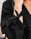 Seersucker mini beach dress with tie cuffs, button front, V-neckline, and ¾ sleeves – perfect for warm-weather layering
