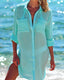 Relaxed fit beach cover-up with V-neckline, flowy silhouette, and side slits for stylish swim layering