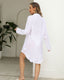 Relaxed fit beach cover-up with V-neckline, flowy silhouette, and side slits for stylish swim layering