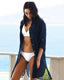 Relaxed fit beach cover-up with V-neckline, flowy silhouette, and side slits for stylish swim layering